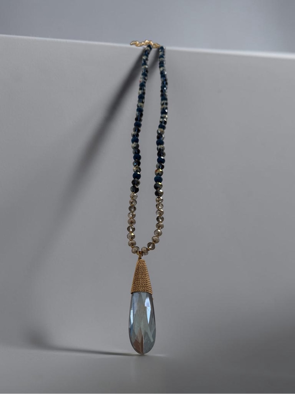 Gold-Accented Blue Teardrop Pendant Necklace
